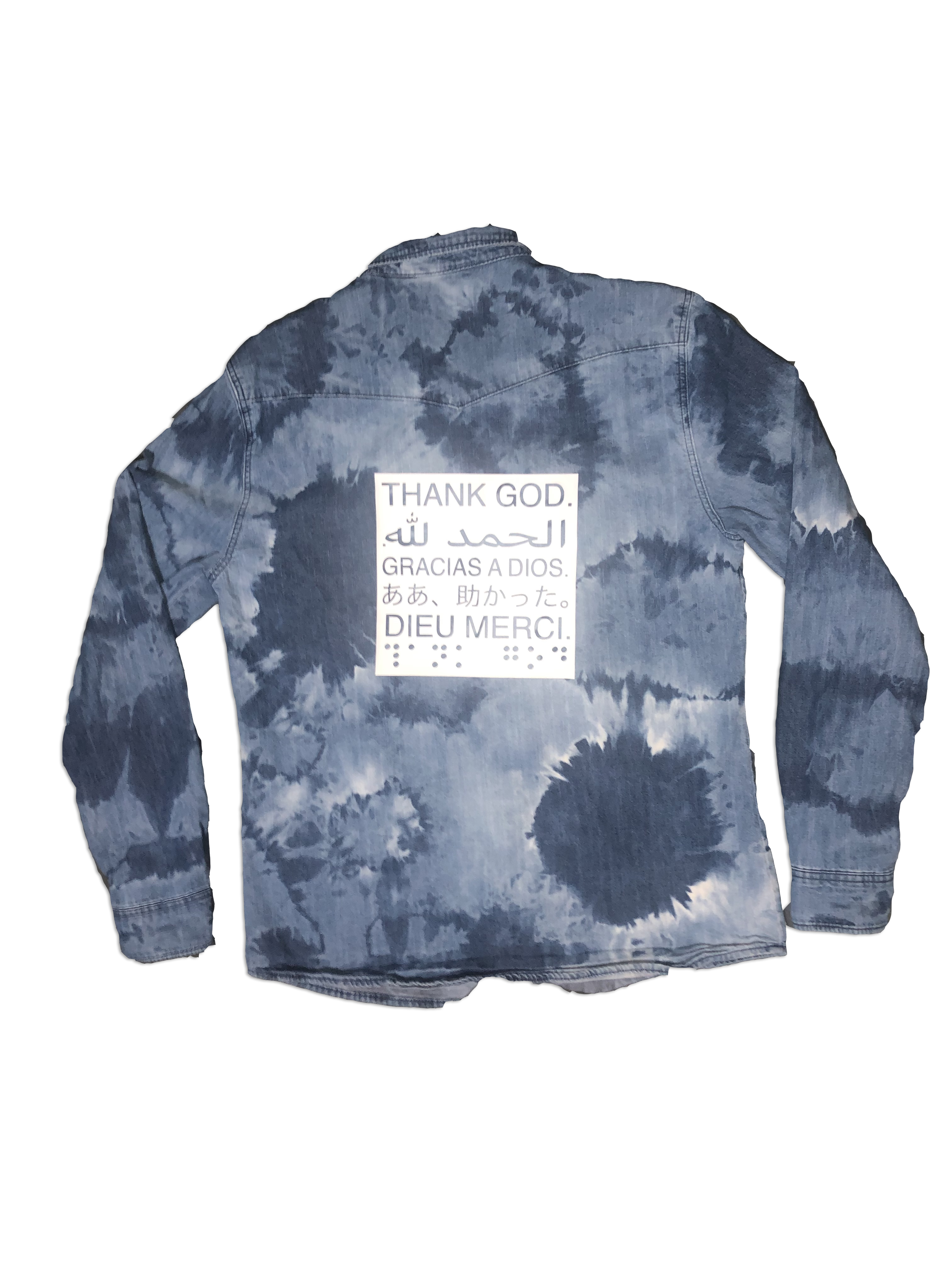 This is a bleach dyed jean jacket with thank god written on it